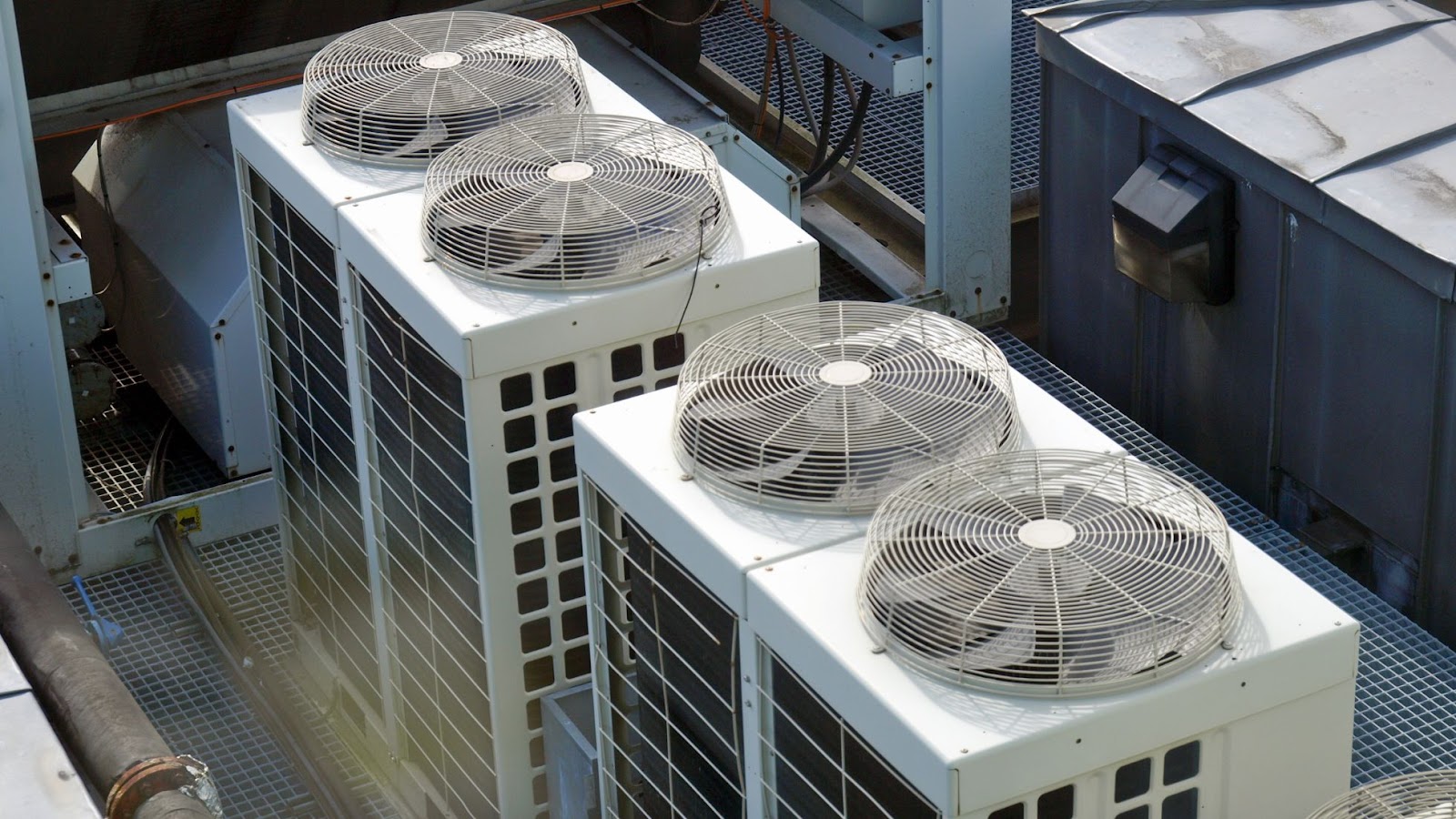 Two HVAC units next to each other.