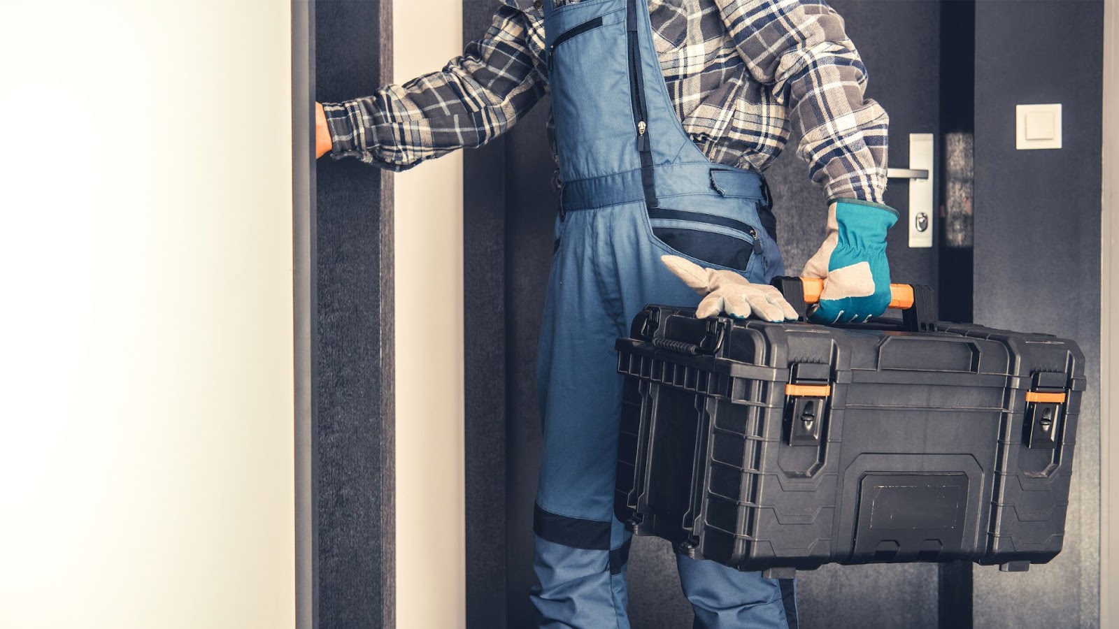 An HVAC expert with a tool box.